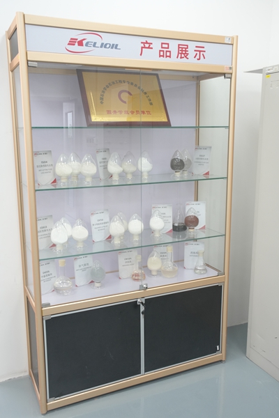 Premium cementing chemical additives including fluid loss control agents and high temperature retarders